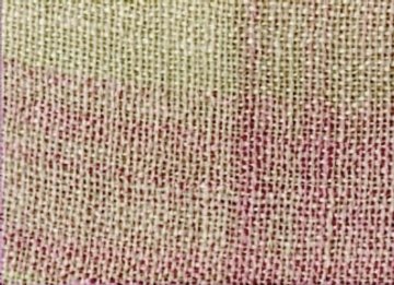 Closeup image of the light rose throw weave