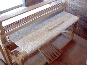 weaving the central panel of the bed spread
