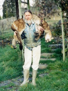 Stan carries another tom from the woods