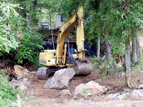 excavator boulder placement